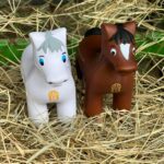 Charlie Horse and Sparkle proudly display the A&O logo.